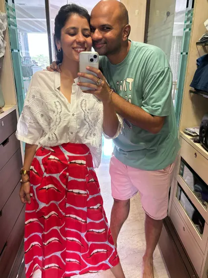 Celebrating a decade with my husband. This picture captures one of our many unintentionally color-coordinating moments, with my lip-print skirt and his pink shorts.