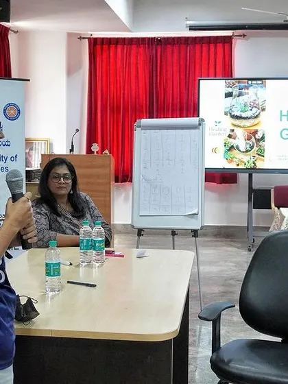 A student from Ramaiah University sharing her experience, with me shaking her hand. These collaborations are built on mutual respect and a shared love for nature.