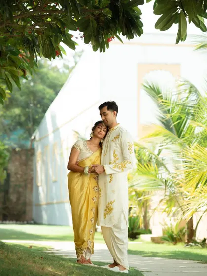 A quiet, romantic moment for the couple amidst the Haldi celebrations. We schedule time for these personal photoshoots within the busy wedding timeline.