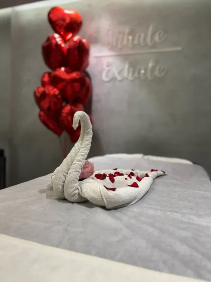 It's all in the details. A beautifully folded swan towel and scattered rose petals are small touches I use to make your experience feel special and luxurious.