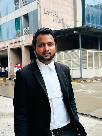 Standing outside the Lawyers' Chamber Block at Rohini Court. This is where much of the case preparation and strategy work happens.