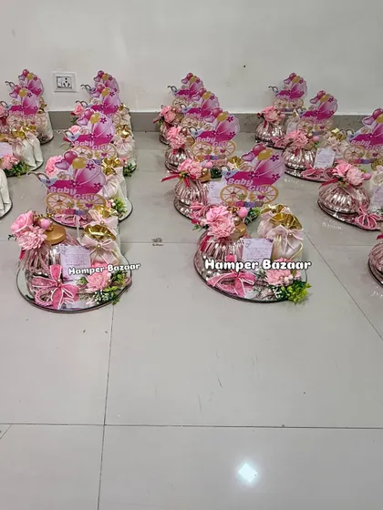 We prepared a large order of these elegant 'Baby Girl' hampers for a client's celebration.