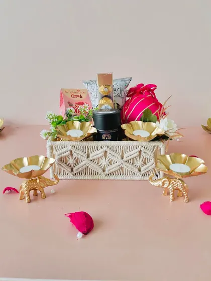 Here, the macrame tray is paired with golden elephant t-light holders, offering a different but equally elegant decorative option.
