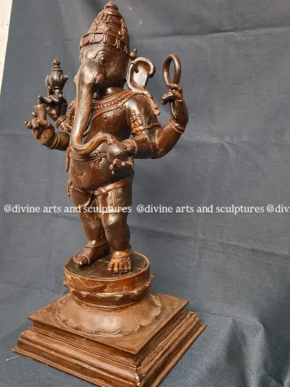 This is the wax model of a standing Ganesha, the remover of obstacles. Even in wax, the sculpture has a sense of weight and presence, with his traditional attributes like the pasha (noose) and modak (sweet) clearly defined.