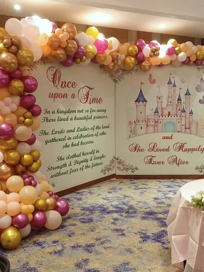 We can tell a story with our decor, like this "Once Upon a Time" fairy tale book backdrop. This unique setup opens like a book to reveal a castle, creating a magical and immersive experience for a princess themed party.