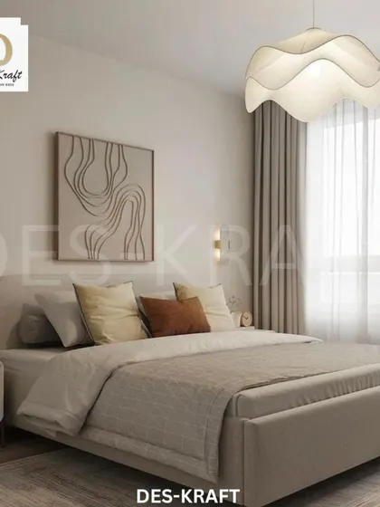 This view showcases the bed with its abstract wall art and layered neutral bedding, creating a restful and aesthetically pleasing environment.