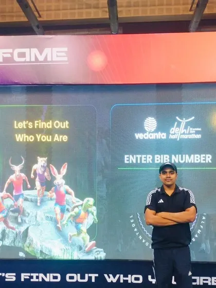 Arms crossed, feeling proud of the preparation for the race.