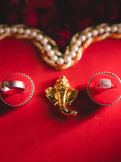 The engagement rings, presented with blessings. We believe in capturing the details, as these small elements hold great significance in your story.