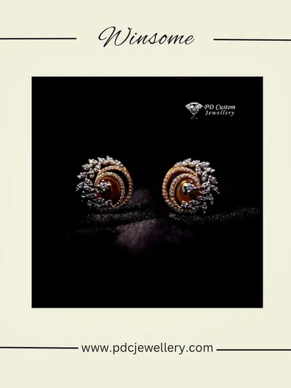 A winsome pair of 18kt hallmarked gold and diamond earrings. The swirling, spiral design is both dynamic and elegant, making it a standout piece.