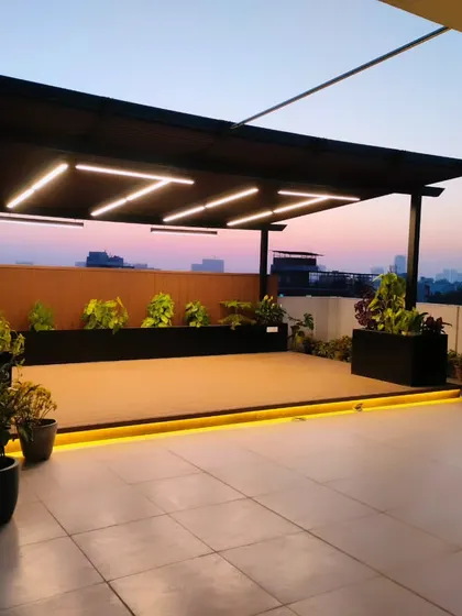 A minimalist shot of the completed pergola against the evening sky in Gurgaon.