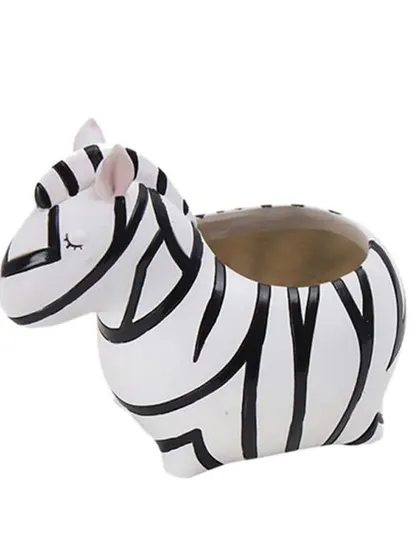 This cute Zebra resin pot is perfect for adding a playful touch to your plant collection. It's designed to hold small succulents and has a drainage hole to keep them healthy.