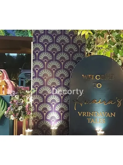 A stylish welcome area for the Vrindavan event, combining traditional patterns with modern design elements.