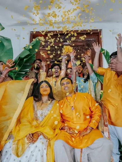 The Haldi ceremony is full of candid, joyful moments. Here, guests playfully apply turmeric to the bride and groom, and we are there to ensure the setting is as beautiful as the emotions.