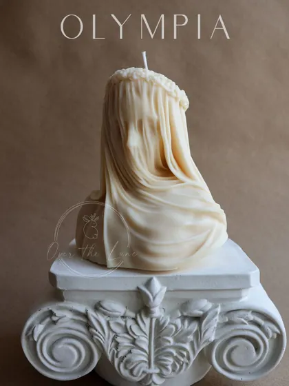 A side view of the Veiled Lady bust, highlighting the delicate floral crown and the soft drape of the veil. It's a piece I'm incredibly proud to have crafted.
