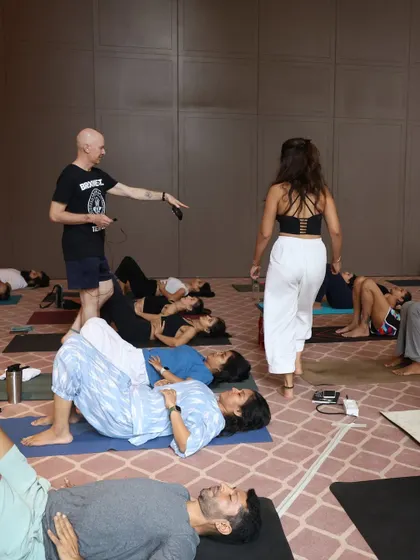 A moment of instruction during a restorative session. Even in a large workshop, I make sure to connect with students and offer personalized guidance.