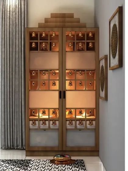 The same pooja unit with its doors closed, showing the elegant design that allows it to blend seamlessly with the living room decor.