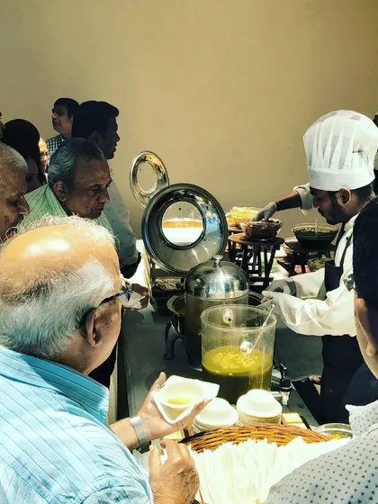 We were honored to cater for Shilpa Khanna, founder of Fast&Up. This image shows guests enjoying our live chaat counter, a popular and engaging addition to any corporate function.