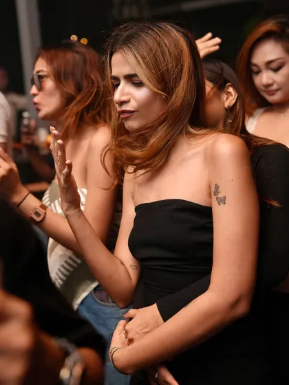 A cool and confident dancer enjoying the vibes.
