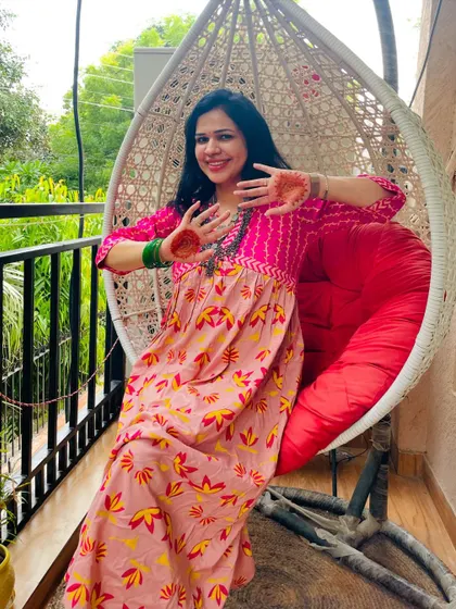 This fun pink and yellow printed dress is perfect for a sunny day. I wore this for Teej and the bright colors just made me so happy.