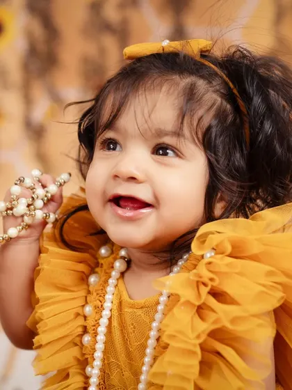 A close-up on that angelic face. The details matter in our themed baby photography sessions.