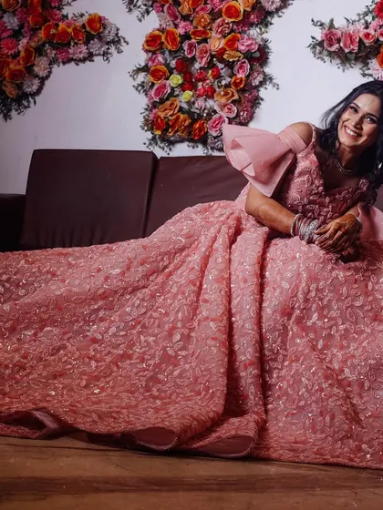 A joyful portrait of the bride-to-be, looking radiant and happy in her engagement gown.