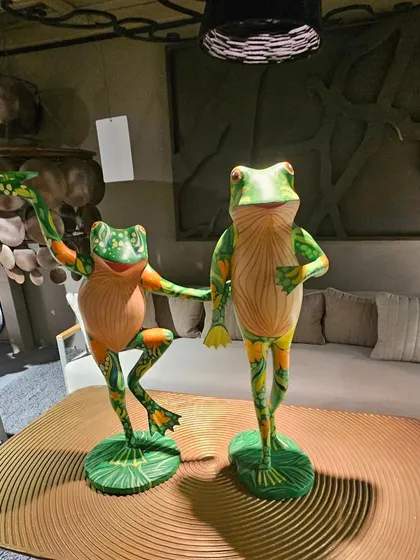 Add a touch of whimsy to your space with these colorful dancing frog sculptures. They are a fun and playful addition to any garden or tabletop.