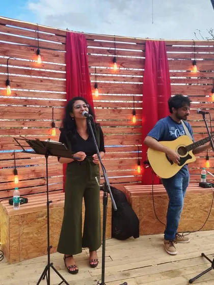 An acoustic duo performance with my guitarist. This setup is perfect for smaller, more intimate events that call for a stripped-down, warm, and personal musical experience.
