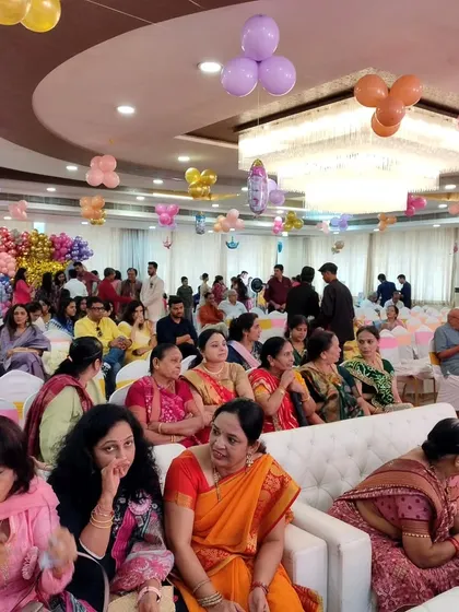 A room full of happy guests enjoying the festivities. I love looking out and seeing a crowd that is fully engaged and having a great time.