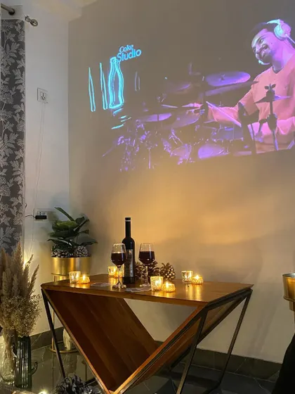 I believe in making every moment special for your loved ones. This setup with wine, candles, and music is designed to do just that.