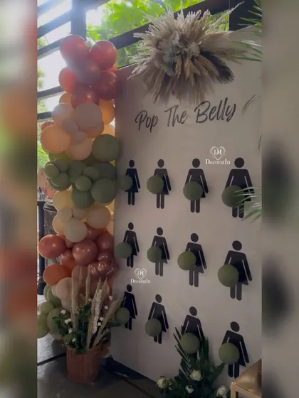 Fun and games are a must at a baby shower. This "Pop the Belly" game board is a playful and interactive way for guests to have fun and celebrate the mom-to-be.