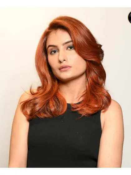 The final result of the copper red transformation. The color is even, glossy, and makes a powerful style statement.