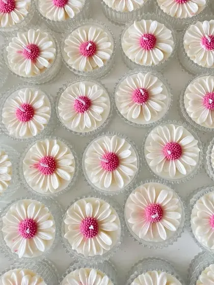 These beautiful daisy candles were customized with a pink center. They are very trendy and perfect for adding a Pinterest-worthy touch to any event.
