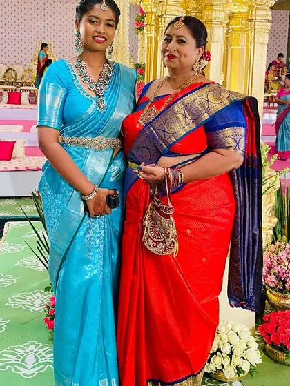 Another shot of this beautiful pair, their coordinated yet distinct sarees showcasing their personal styles.