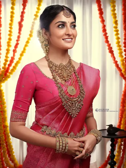 A radiant smile from the model during our shoot. The lighting highlights the smooth, flawless finish of the HD makeup, which is essential for both photography and videography on a wedding day.