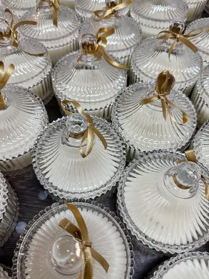 Our crystal jar candles are a stunning choice for wedding favors. The intricate glass design catches the light beautifully, making it a gift that doubles as decor.