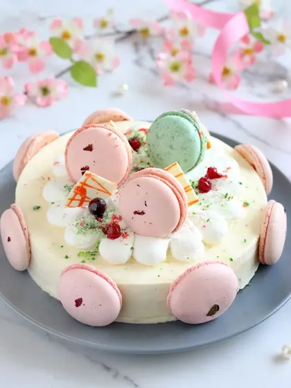 Looking for a slice of heaven? Our Valley of Vanilla Cake is a beautiful treat with layers of soft vanilla sponge, fruit of the forest jelly, and silky cream, garnished with delicate macarons for a classy finish.