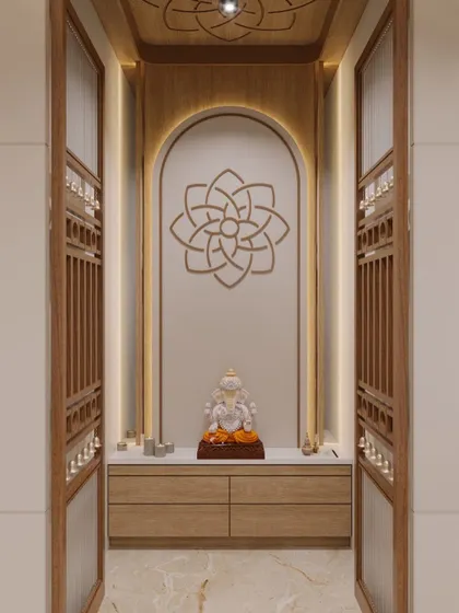 I design custom pooja units that integrate seamlessly into modern homes. This example features an arched niche with soft backlighting, a geometric mandala motif, and traditional latticework doors, creating a peaceful and sacred space.