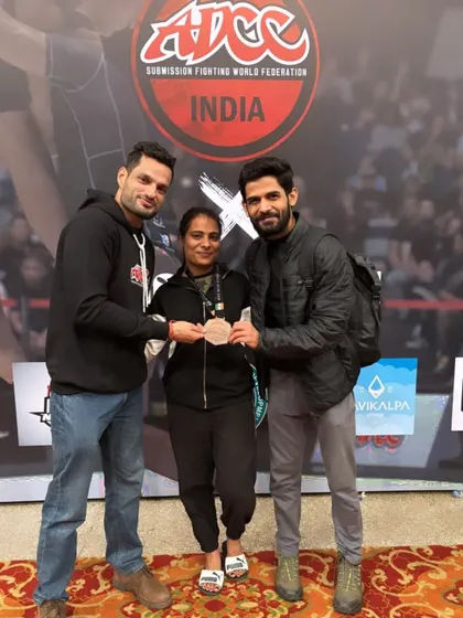 The team celebrating a medal win at ADCC. This is what it's all about: supporting each other through the grind and celebrating the victories.