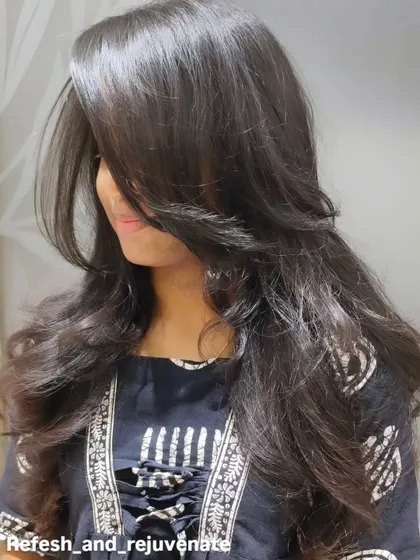 This photo showcases the beautiful shape and texture created by a professional layered haircut.
