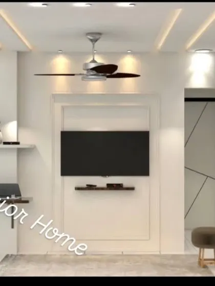 A view of the TV wall in the same bedroom, which has a clean, minimalist design to balance the textured accent wall.
