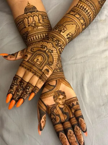 Another view of the full bridal design, showcasing the groom's portrait on one hand and intricate architectural and animal motifs on the other, creating a balanced and personal design.