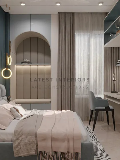 A serene bedroom design featuring a cozy reading nook with an arched, upholstered backrest. The soft blue and pink tones create a calm and gentle atmosphere.