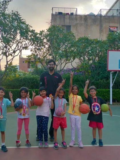 Victory poses from our future stars. Skill development and fun go hand in hand.