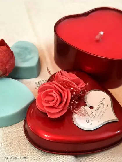 A heart-themed gifting set, featuring a heart-shaped tin candle and heart-shaped wax melts. Perfect for anniversaries or Valentine's Day.