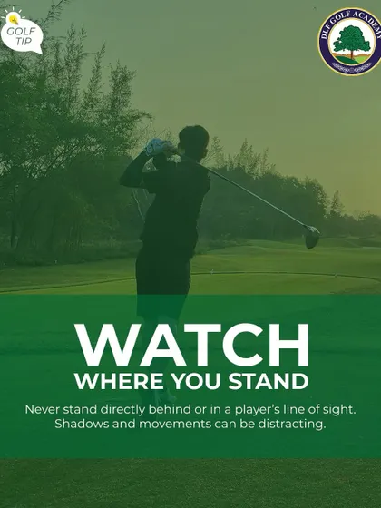 An Image of a Golfer Swinging with an Etiquette Tip: Good golf etiquette means being aware of your position. Never stand directly behind a player or in their line of sight, as shadows and movements can be distracting.