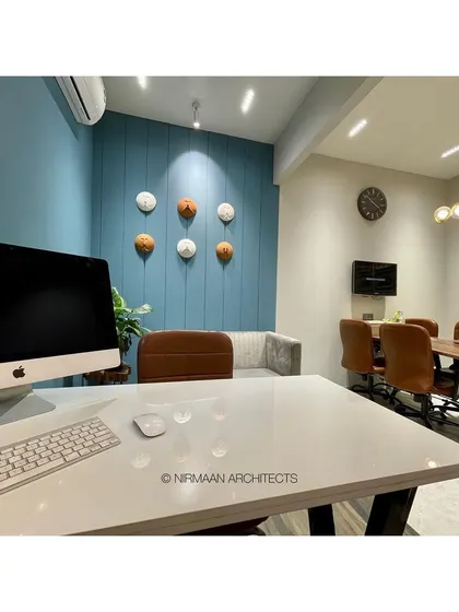 A perspective from the main desk in our studio, looking out towards the conference and lounge area. The open layout encourages constant communication and collaboration within our team.