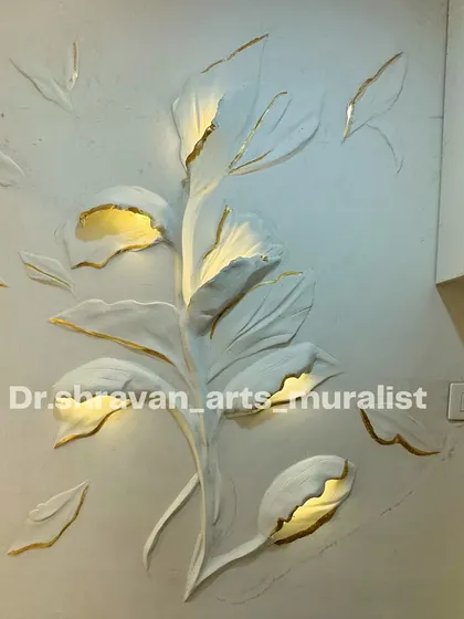 A floral relief sculpture with integrated LED lights. The light emanates from behind the petals, giving the flower a magical glow and highlighting its three-dimensional form.