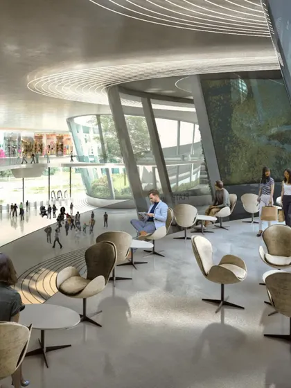 The interior of the station is designed to be a destination in itself, with comfortable seating and views of the bustling environment.