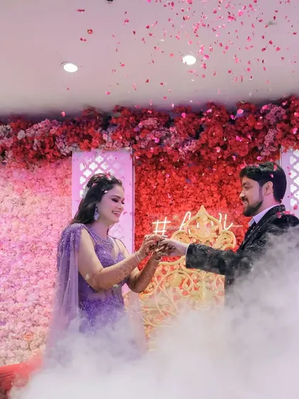 Dancing on clouds. Using a smoke machine adds a dreamy effect to the couple's first dance at their engagement.