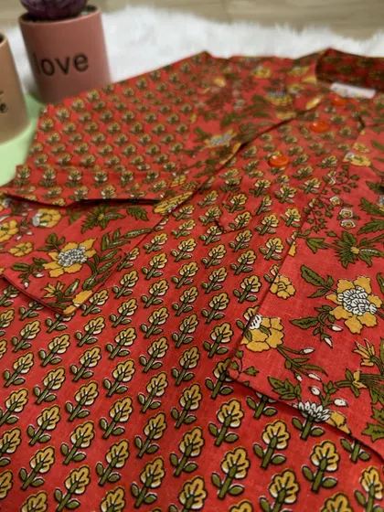 A closer look at the details of our print-on-print magic. This bandi set combines bold florals with classic stripes for a truly unique and stylish outfit.